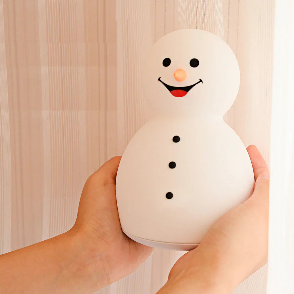 Enchanting snowman-shaped night light with color-changing LED illumination and rechargeable battery