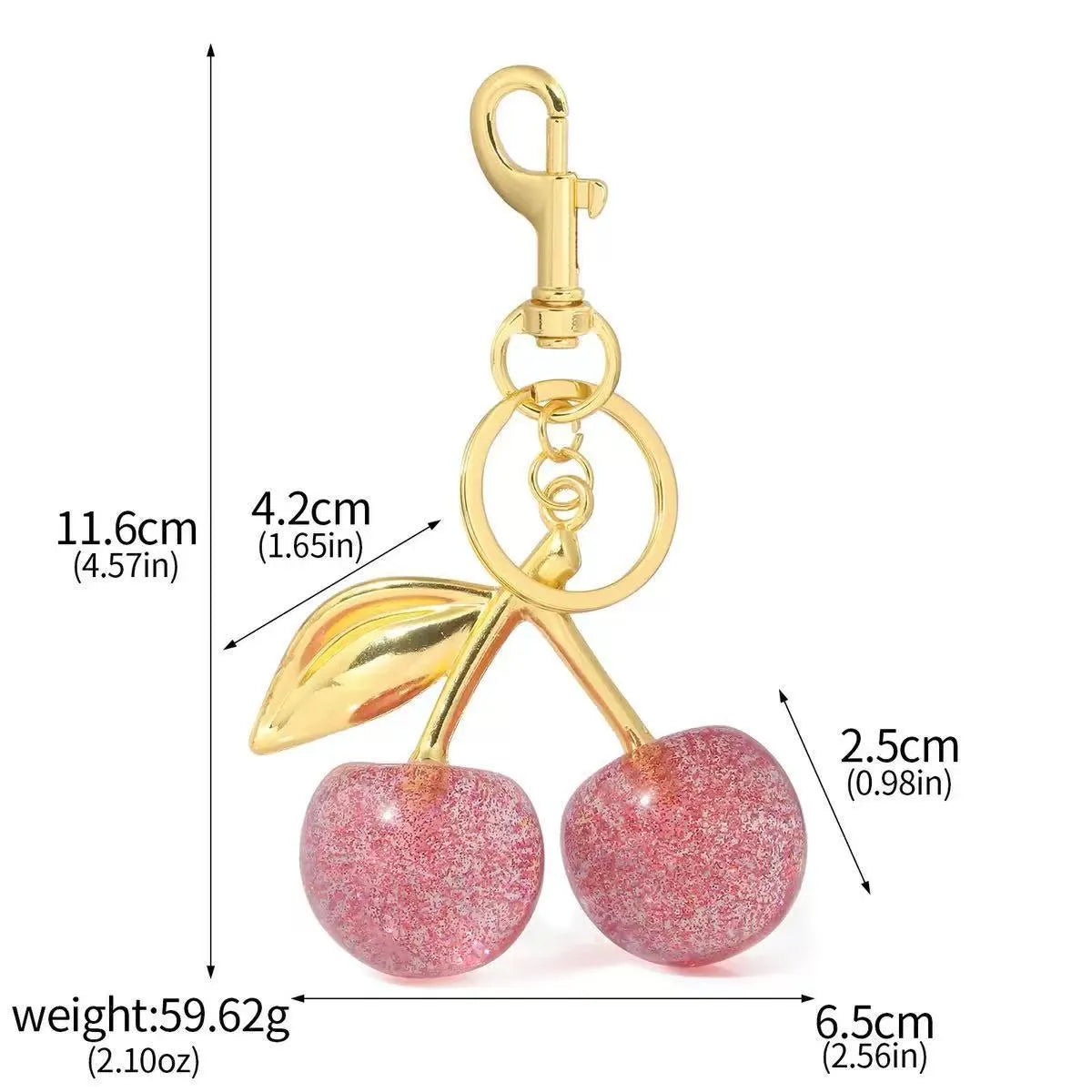 Red zinc alloy cherry-shaped keychain pendant on a key ring.