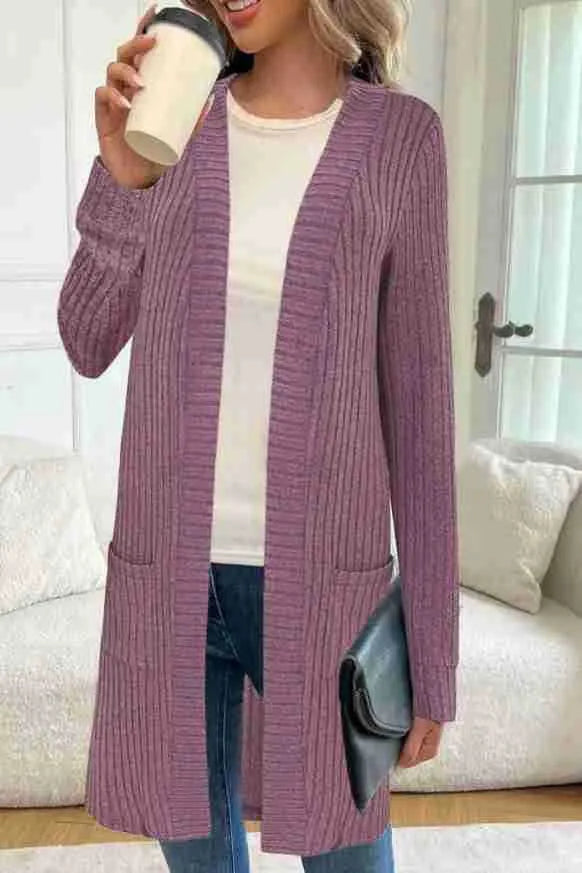 Long sleeve loose fit knitted cardigan jacket with side pockets, shown in grey.