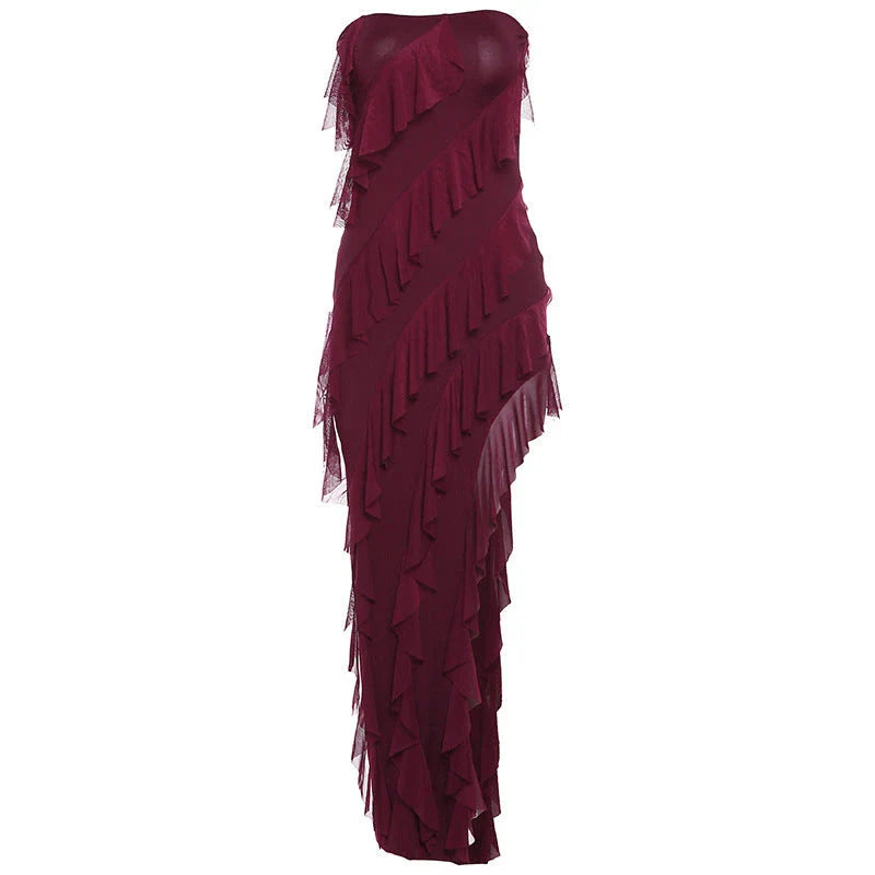 Stylish backless tube top dress with tassel accents in various colors, including black, wine red, red, and brown.
