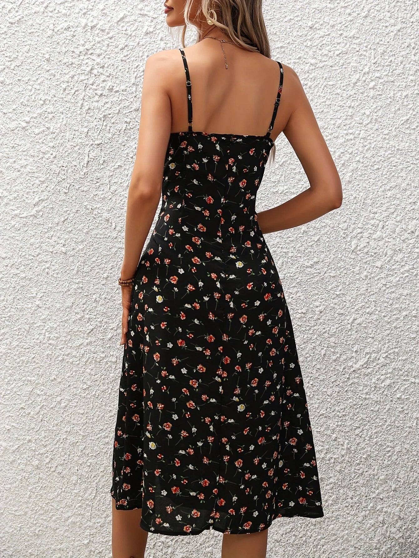 Elegant polka dot suspender dress with flattering side slit for women's summer fashion