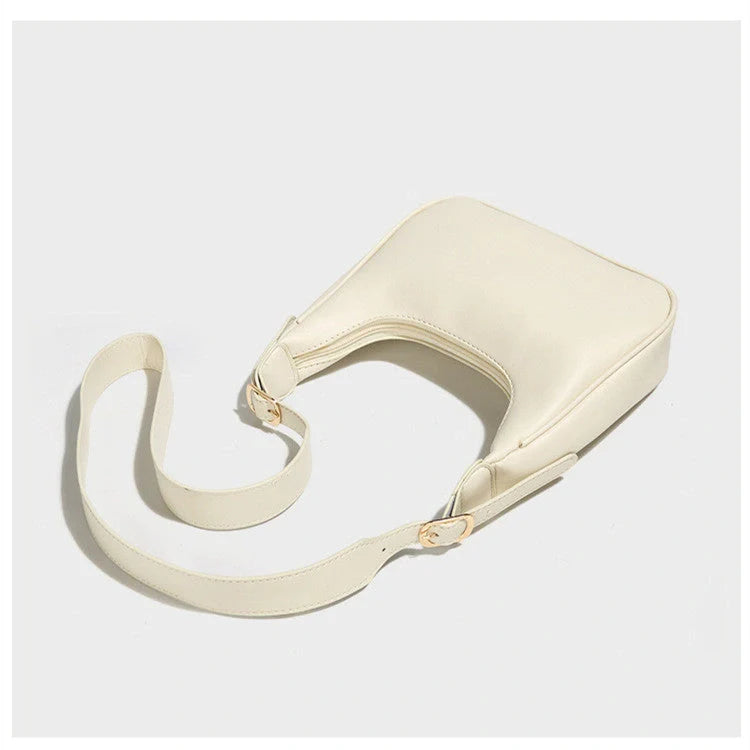 Stylish women's crossbody dumpling bag in soft PU with a crescent shape