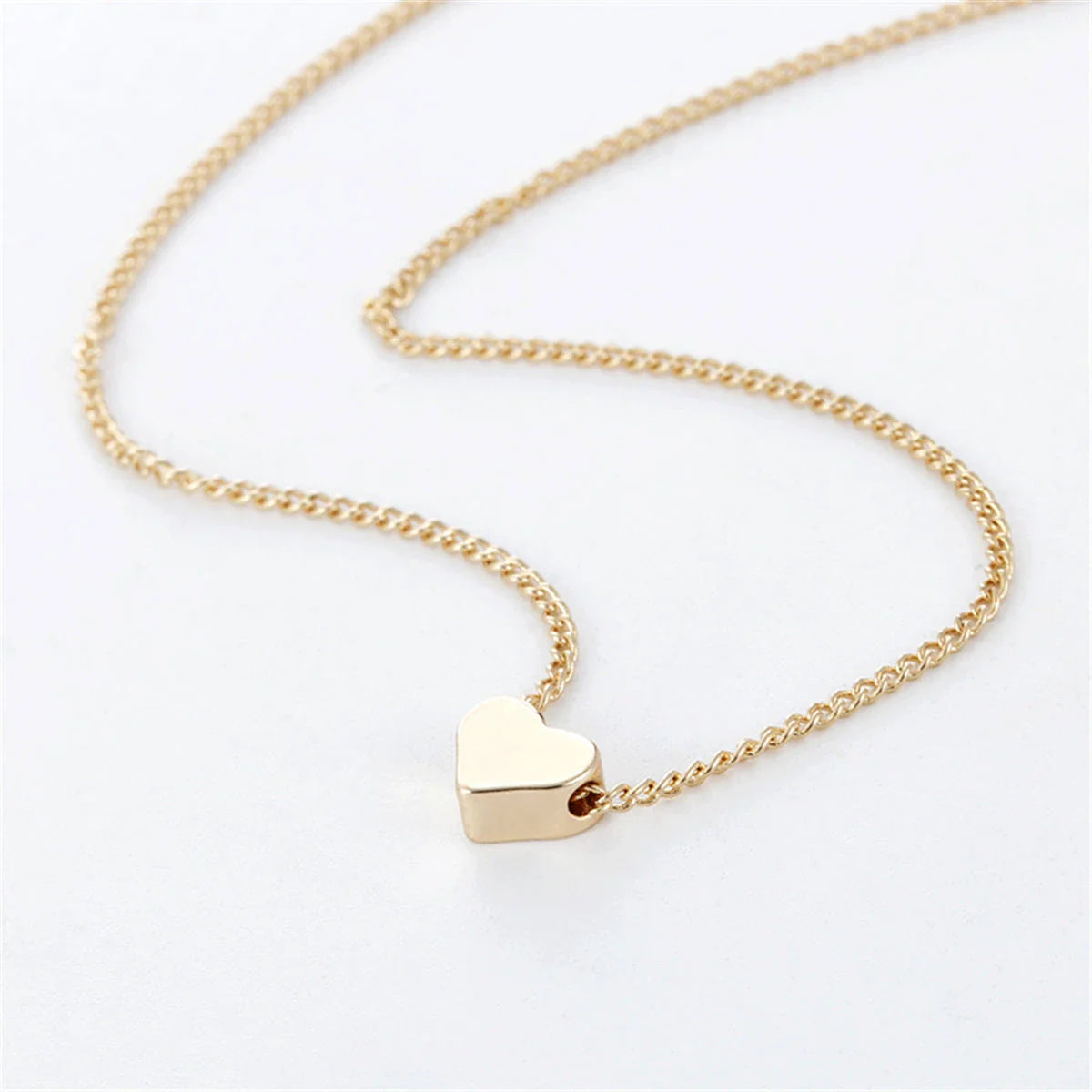 A stylish double-sided love pendant necklace made of premium alloy and featuring a chic geometric design, perfect for elevating any outfit.