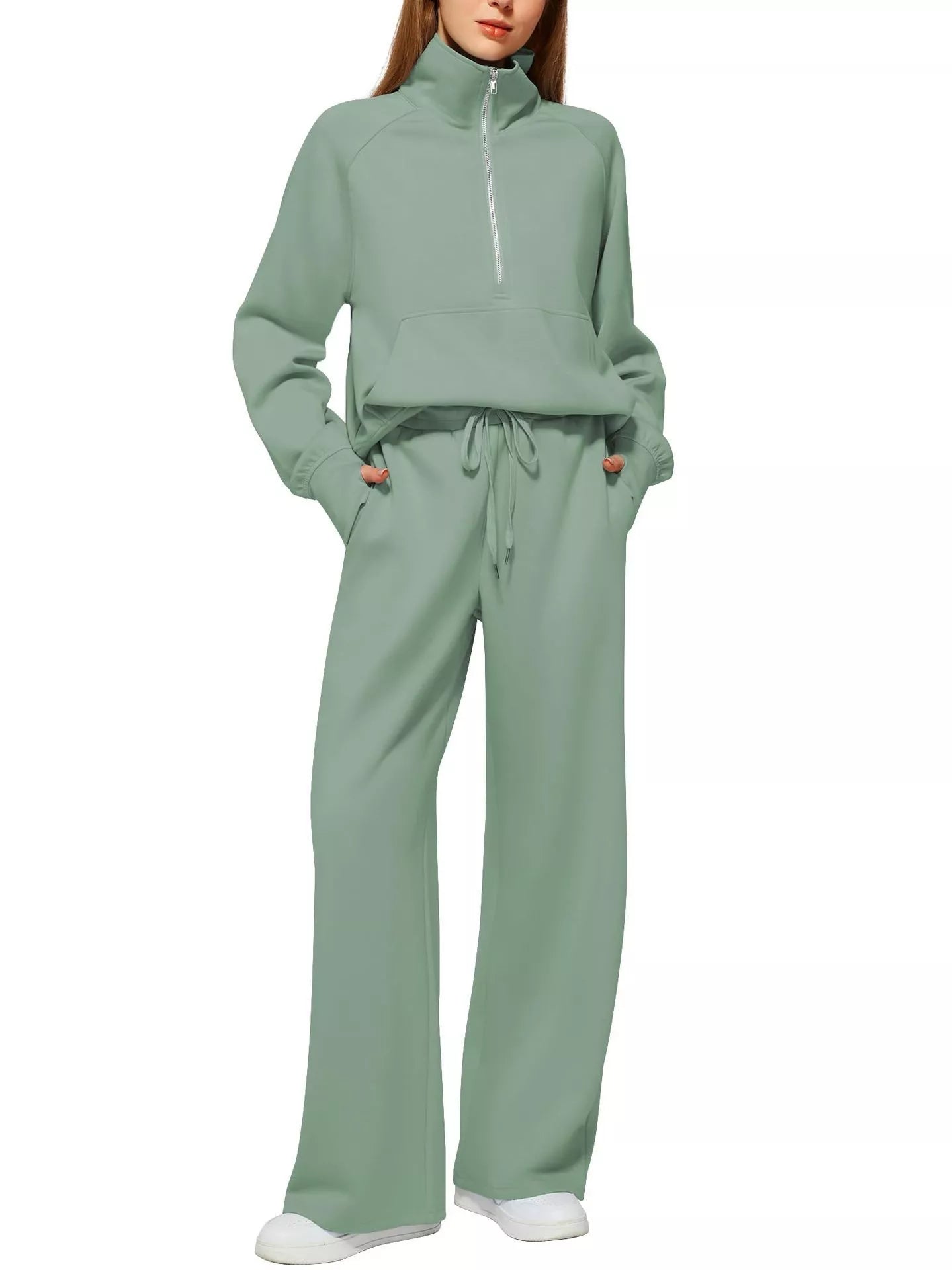 Women's solid colour long-sleeved sweater trousers suit in polyester, available in multiple colours and sizes.
