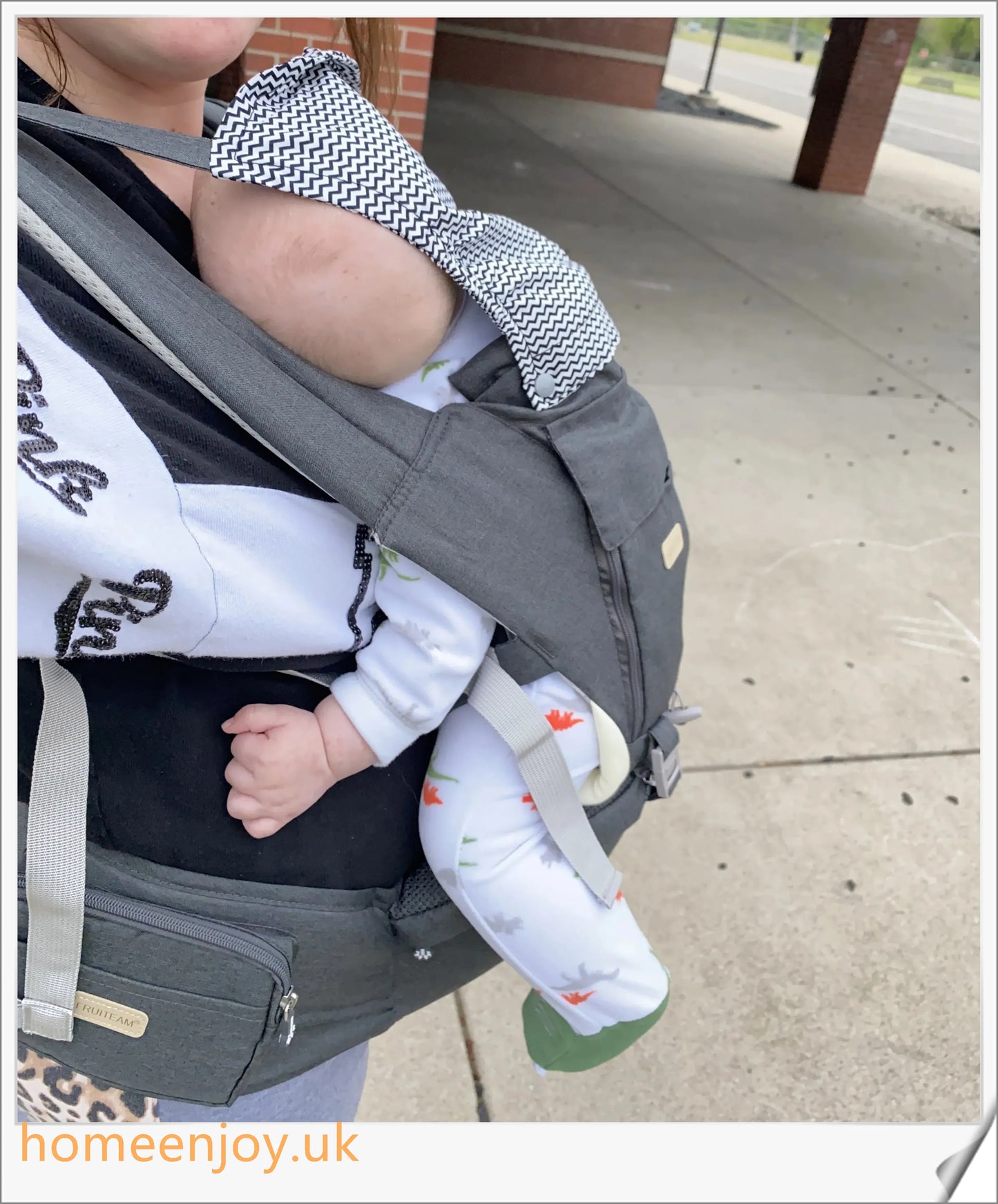 Ergonomic baby carrier made with soft, breathable cotton for comfortable, secure babywearing