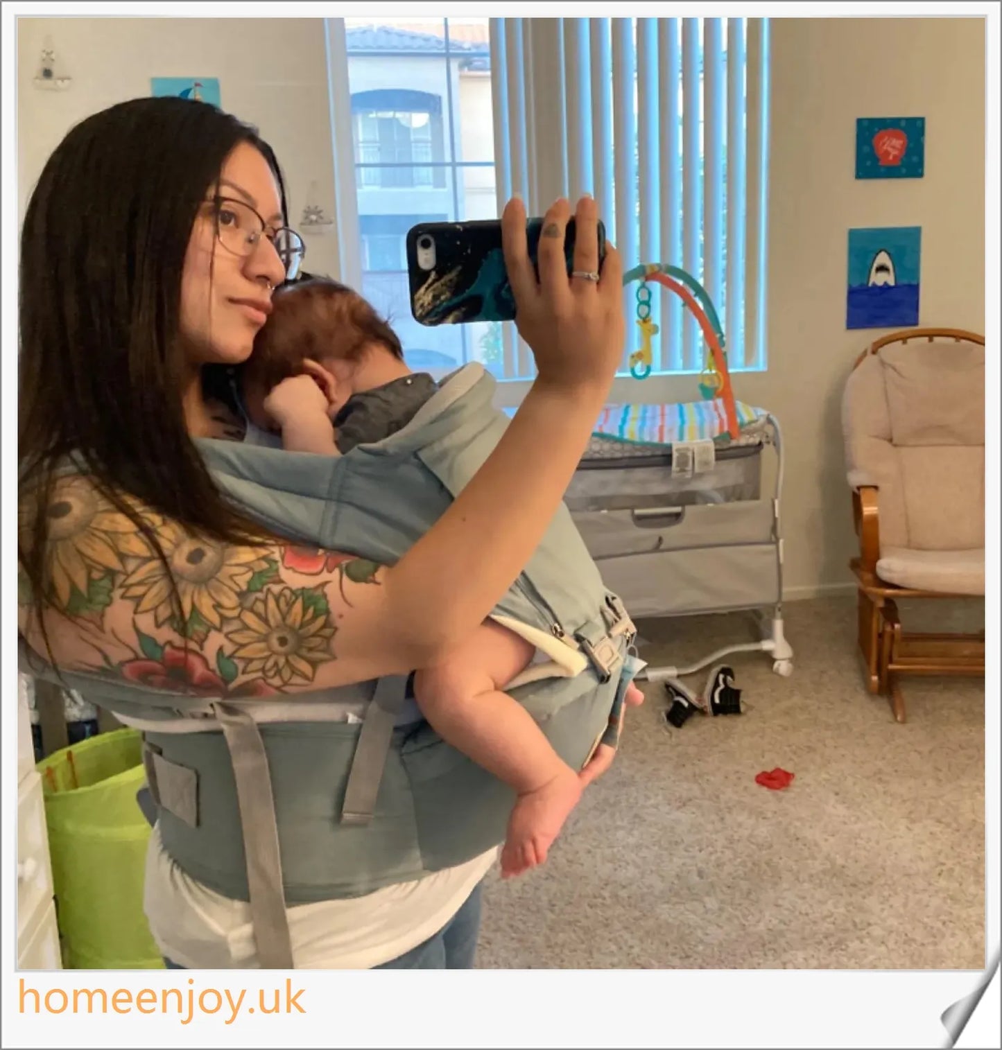 Ergonomic baby carrier made with soft, breathable cotton for comfortable, secure babywearing