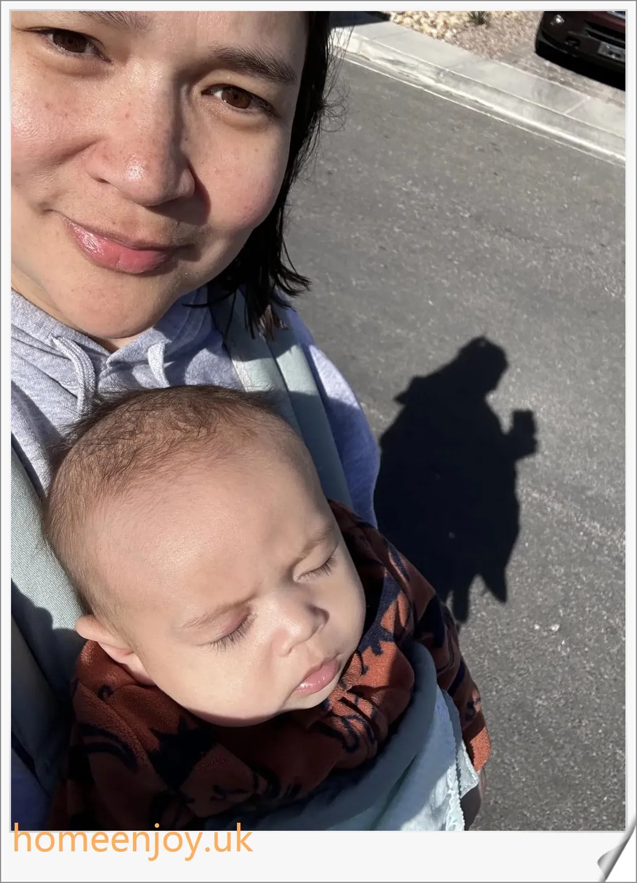 Ergonomic baby carrier made with soft, breathable cotton for comfortable, secure babywearing