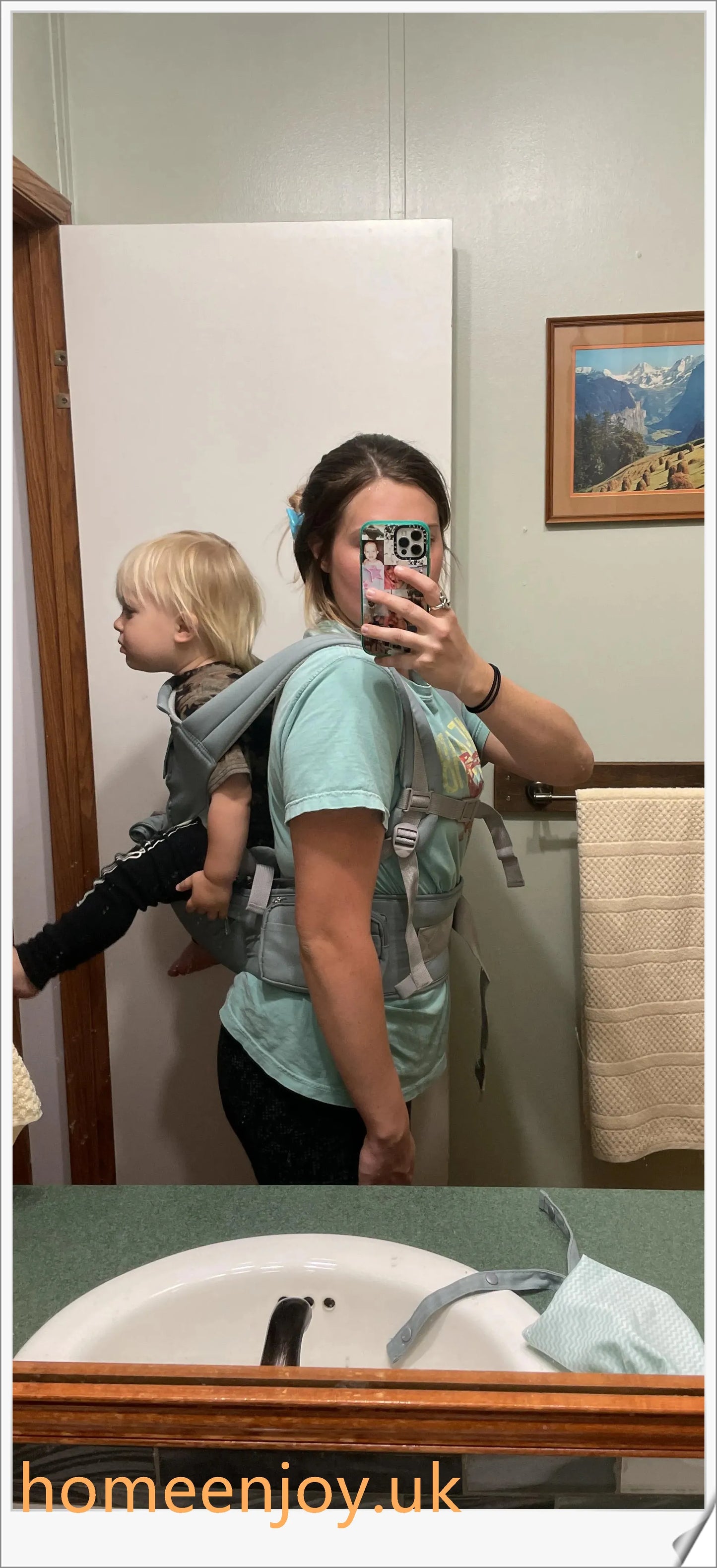 Ergonomic baby carrier made with soft, breathable cotton for comfortable, secure babywearing