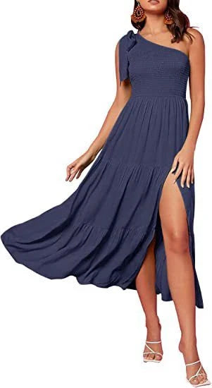 Elegant one-shoulder pleated maxi dress in various colours, featuring an asymmetrical hem and side slits for a stylish, head-turning look