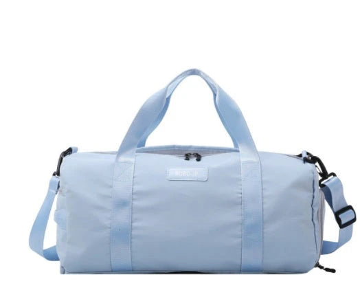 Premium, durable, and waterproof gym bag with multiple compartments and adjustable straps for organized fitness and travel
