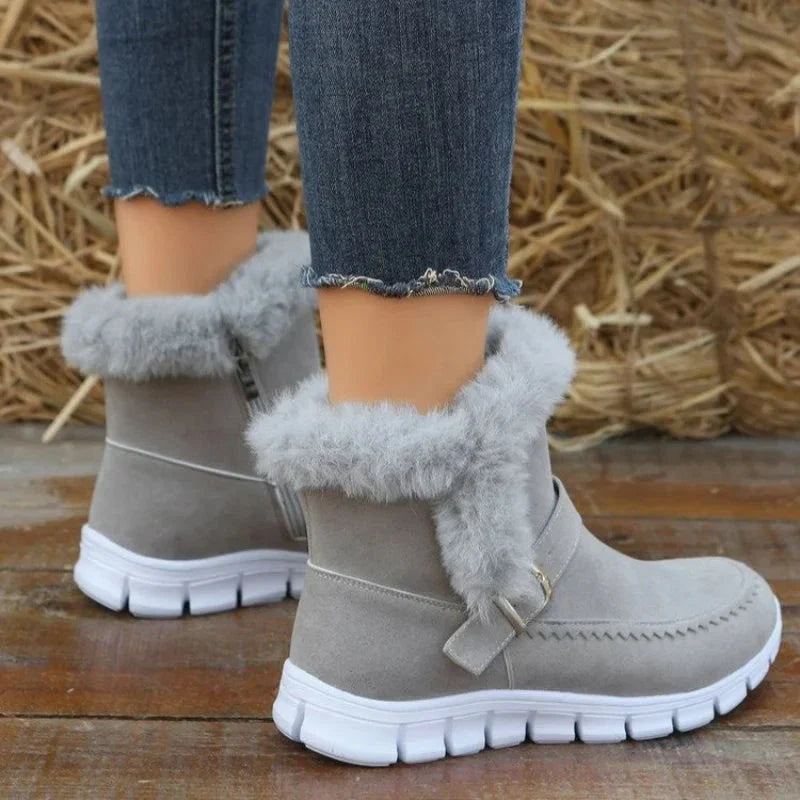 Plush ankle snow boots with buckle design and soft, warm lining for women in various color options