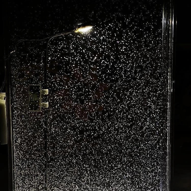 Enchanting DIY snowy night light with warm LED lighting, creating a cozy winter wonderland atmosphere