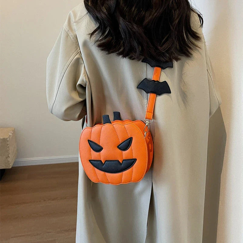 Pumpkin cartoon shoulder bag with adjustable strap and roomy interior, available in various Halloween-inspired colors