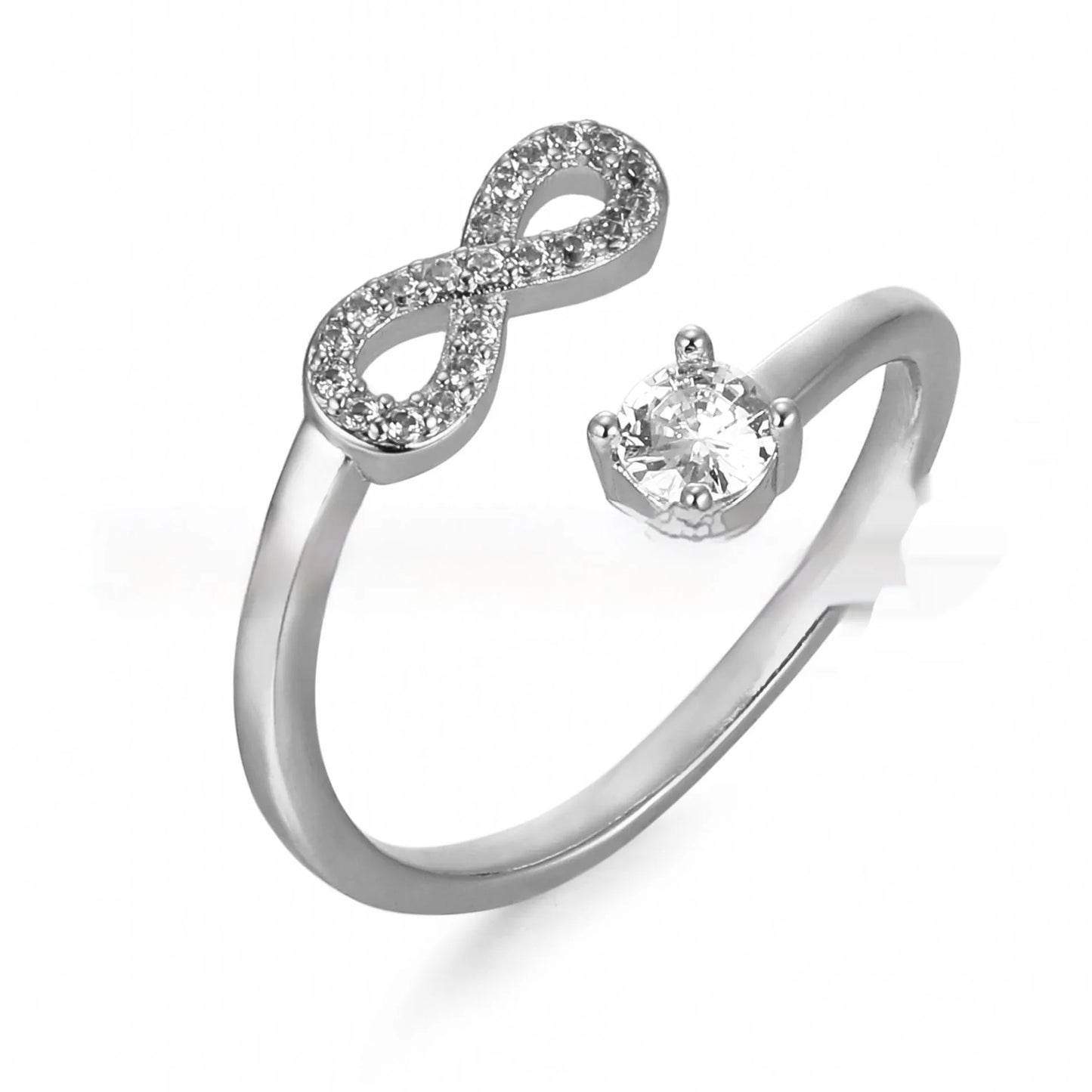 Open geometric ring with a zircon-encrusted letter 'A' in rose gold on a finger.