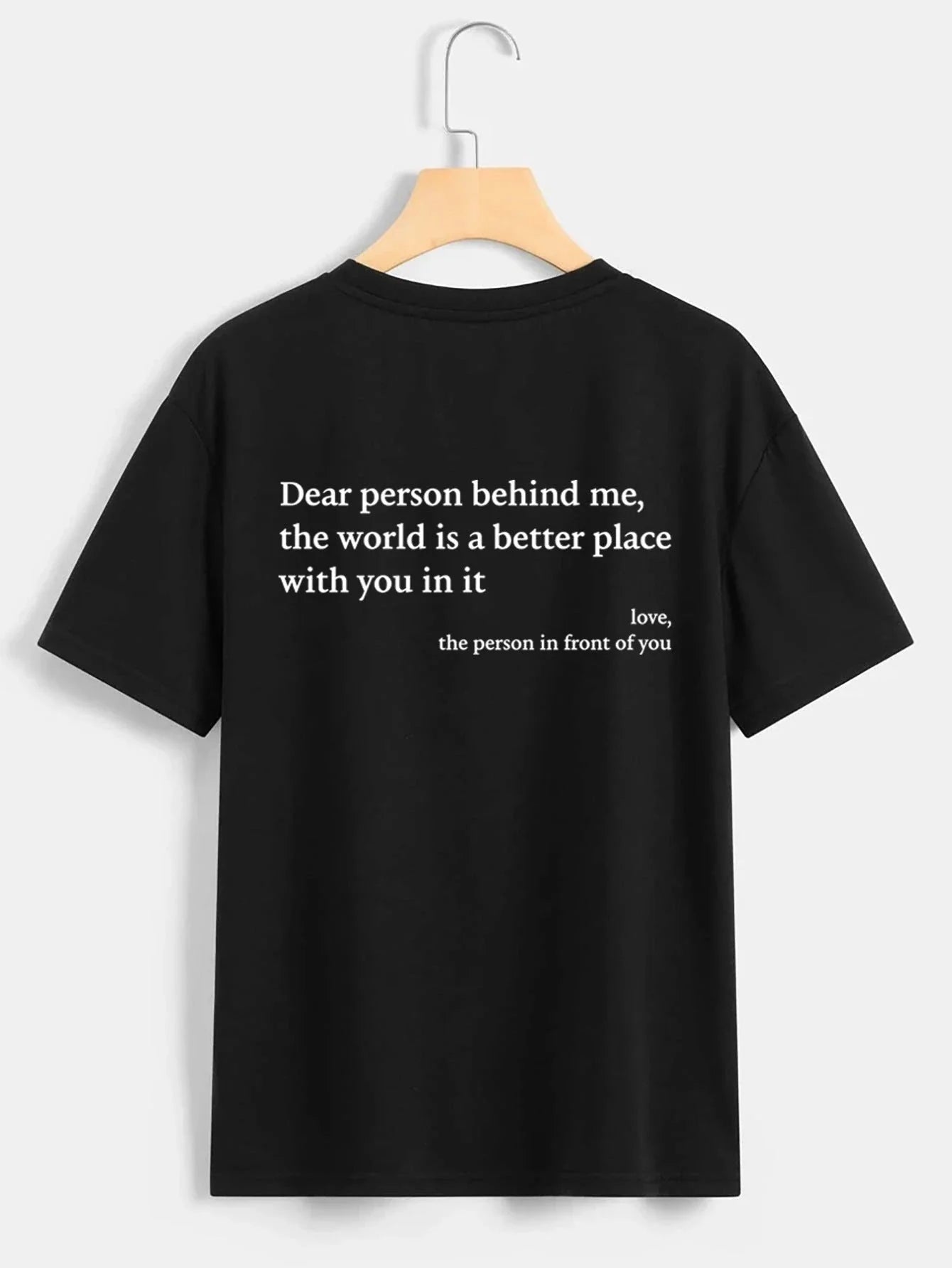 Stylish women's graphic t-shirt with trendy slogan, featuring a vibrant print design and comfortable short sleeve silhouette.