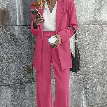 Tailored ladies' suit in various colours, featuring a jacket and trousers made of premium polyester fabric.