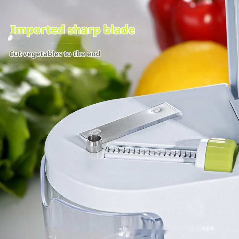 Multifunctional mandoline slicer with suction base and four drum blades for versatile kitchen prep.