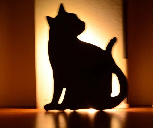 Charming pet-inspired mood lamp with various animal-shaped designs, including walking cat, mother and child cat, licking cat, and Pikachu