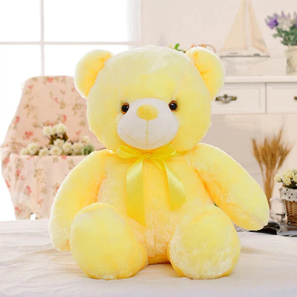Illuminating plush teddy bear with color-changing LED lights, soft and huggable design in various sizes and colors