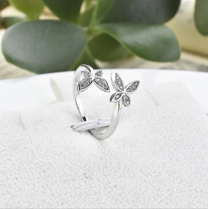 Elegant sterling silver adjustable butterfly ring with gem embellishments