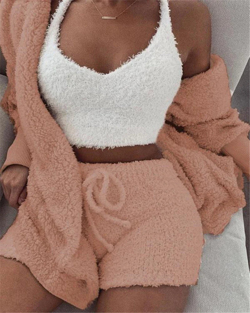 A cozy 3-piece loungewear set featuring a long sleeve crop top and drawstring shorts in a variety of stylish colors.