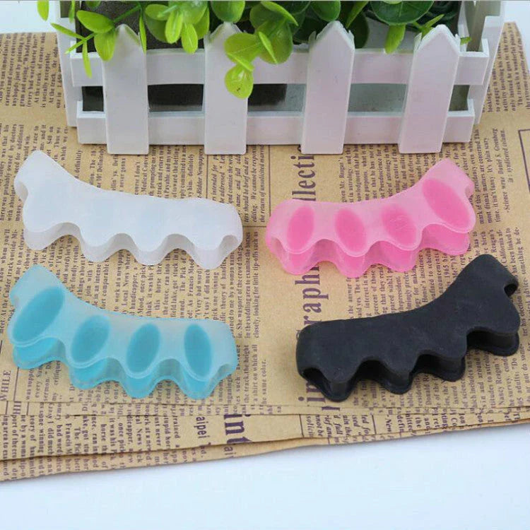 Premium silicone toe separators designed to relieve bunion and overlapping toe pain, offering comfort and support for foot health.