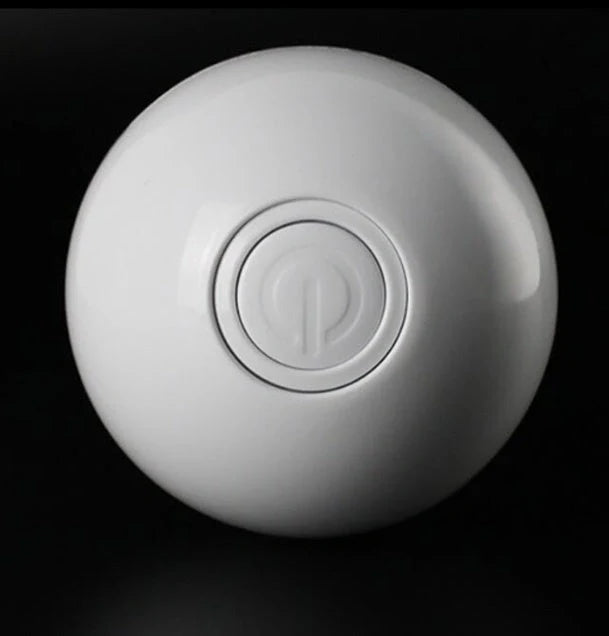 Robotic ball with LED lights and automatic 360-degree rotation, designed to captivate and entertain cats
