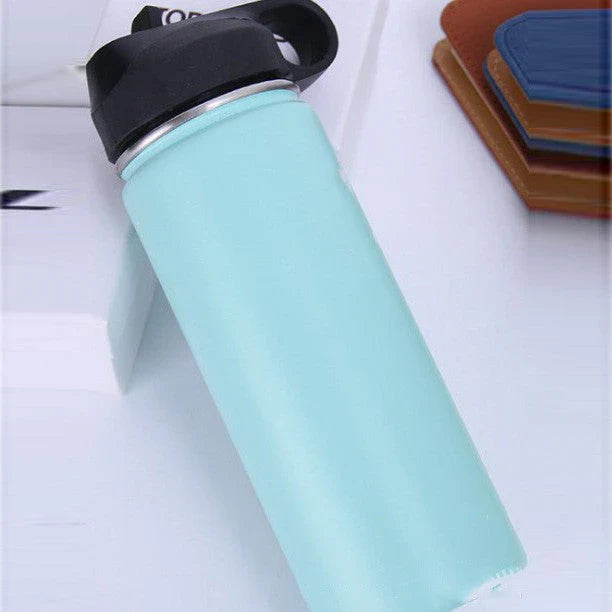 Stainless steel insulated water bottle with wide mouth and push-button lid for hot and cold beverages