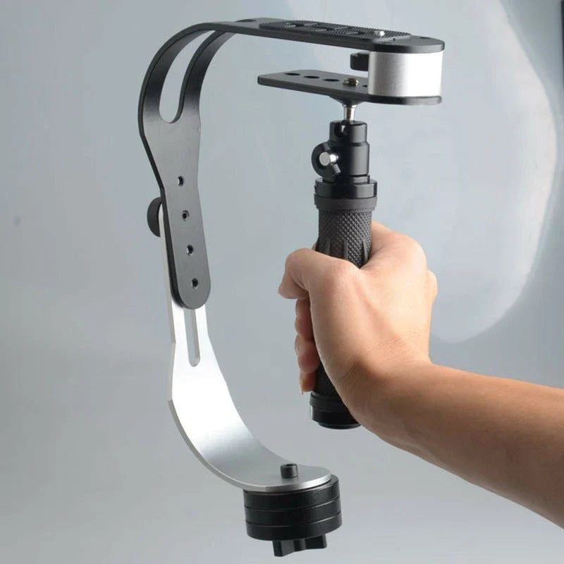 A versatile handheld stabilizer for mobile phones and action cameras, enabling smooth and stable video capture.