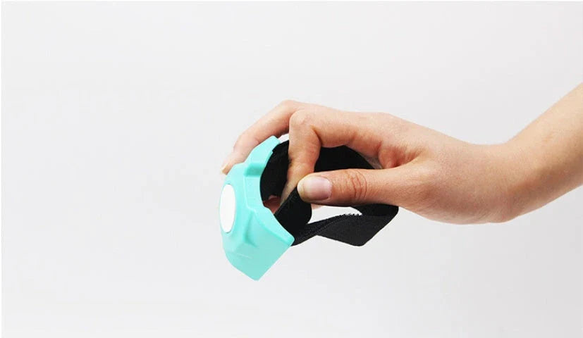 Magnetic water bottle holder in black, blue, and green colors, featuring a silicone cup that can securely attach to any metal surface.
