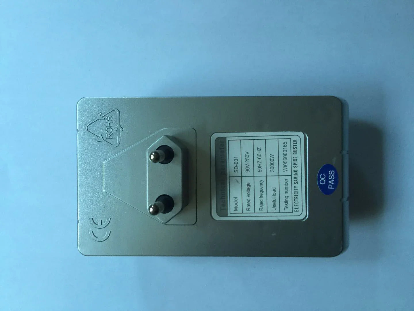 Electricity-Saving Power Adapter designed for American homes, featuring advanced power optimization technology and sleek modern design.