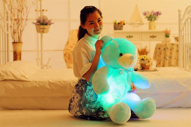 Illuminating plush teddy bear with color-changing LED lights, soft and huggable design in various sizes and colors