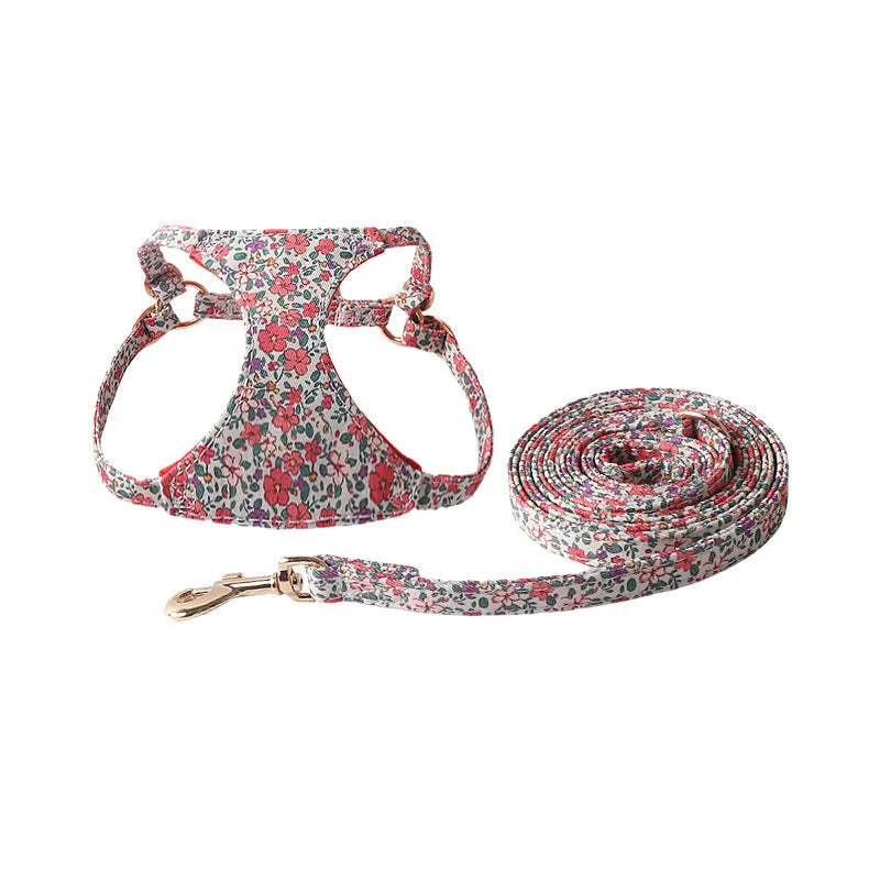 Orange cloth dog harness and leash set from the floral series, showing the single chest back design.