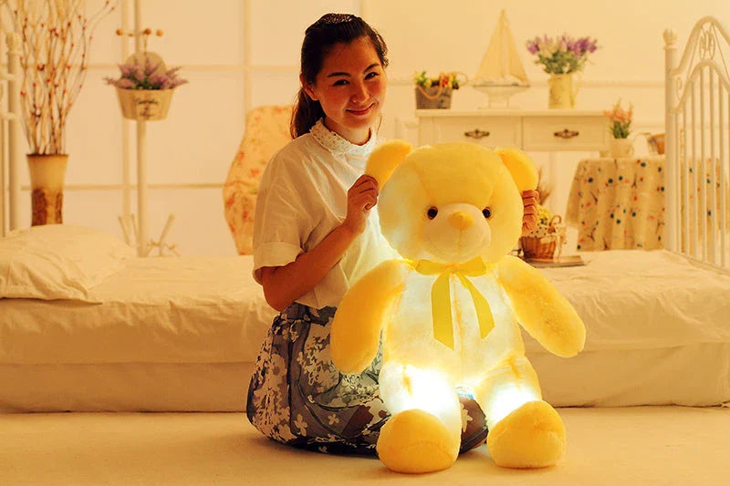Illuminating plush teddy bear with color-changing LED lights, soft and huggable design in various sizes and colors