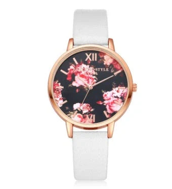 Elegant rose gold women's watch with leather strap and love heart design