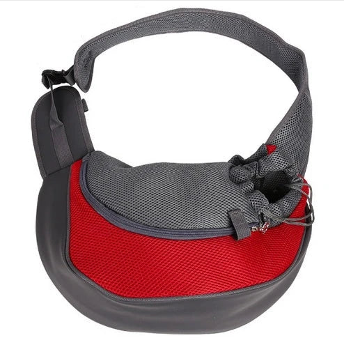 A comfortable and stylish pet sling bag with padded mesh and leather details, allowing hands-free travel for pet owners.