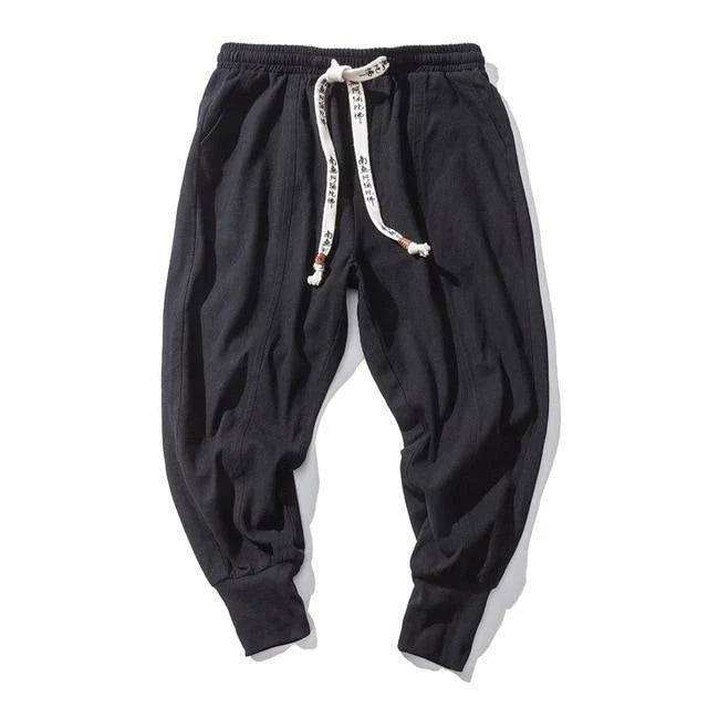 Men's harem trousers made of soft cotton and linen, featuring an elastic waistband and relaxed silhouette for all-day comfort.