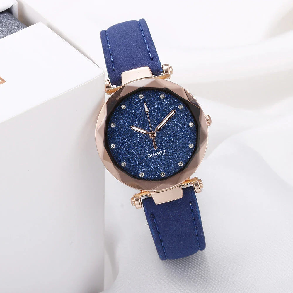 Elegant women's wrist watch with a captivating starry sky dial and leather strap, suitable for any occasion.