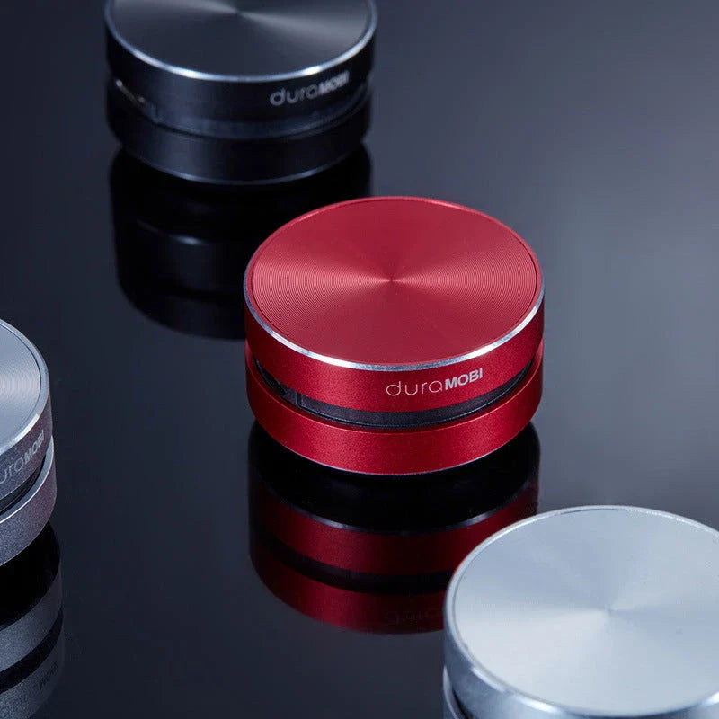 Hummingbird Bone Conduction Bluetooth Speaker transforming a hollow surface into a powerful audio system