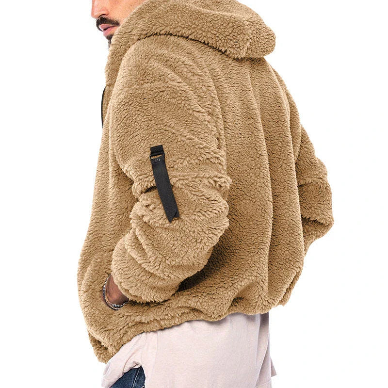 Plush hooded jacket in various colours, featuring a cosy design with a relaxed fit and convenient side pockets