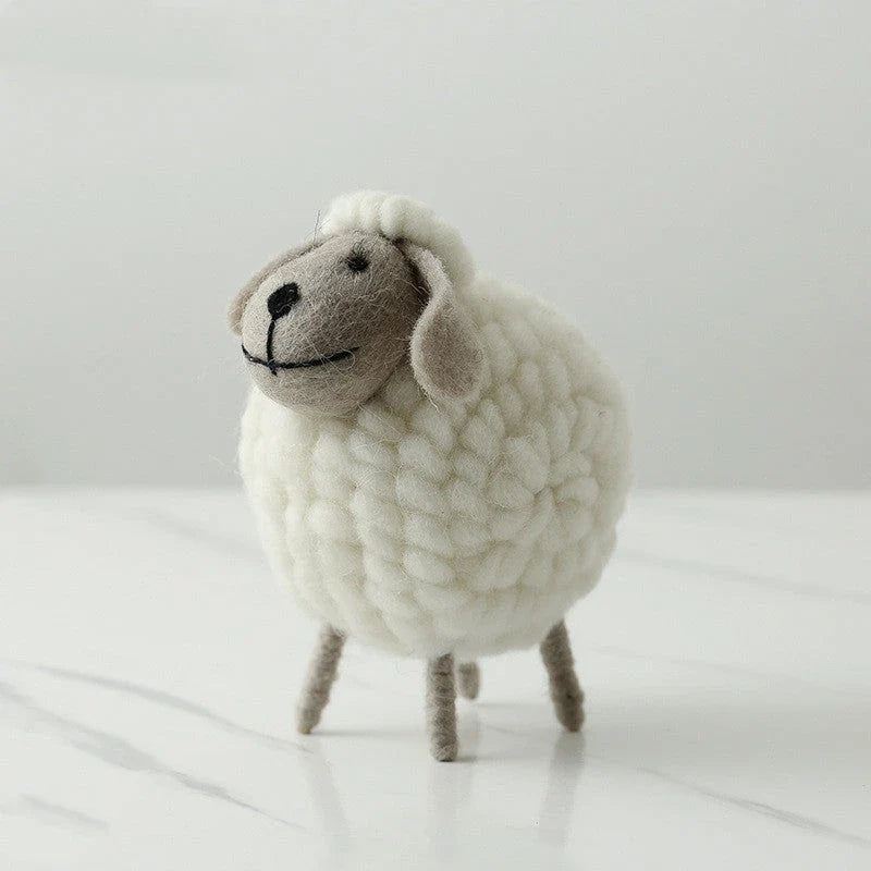 Plush sheep figurines in various colors and sizes, perfect for home decoration and gifting