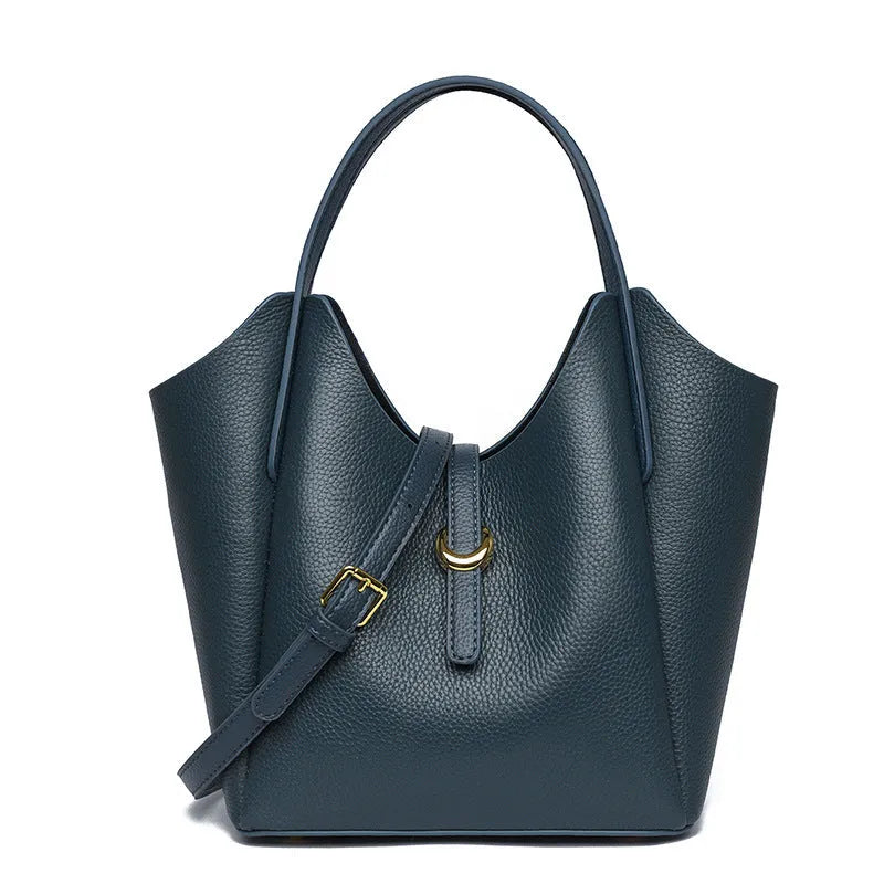 Genuine cowhide leather women's bucket bag in retro style with contrast stitching.