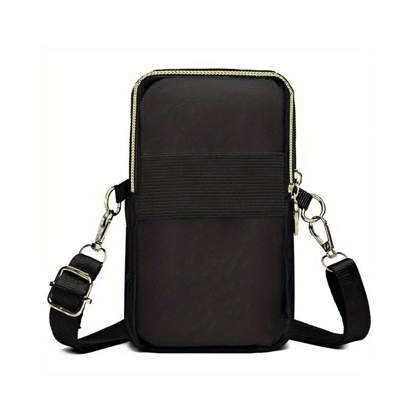 A black crossbody bag with a pumpkin pattern, perfect for Halloween celebrations and everyday use.