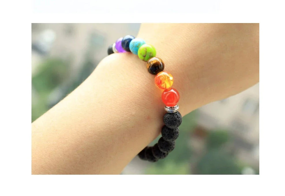 Handcrafted beaded bracelet with seven chakra-representing beads, designed to promote balance and well-being.