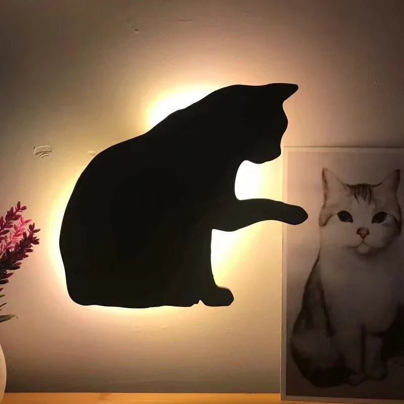 A stylish cat-themed LED lamp that automatically lights up when it detects sound, creating a cozy, ambient glow in a room.