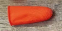 Silicone thumb protector with sharp curved blade for effortless vegetable, fruit, and crop harvesting in the garden or farm