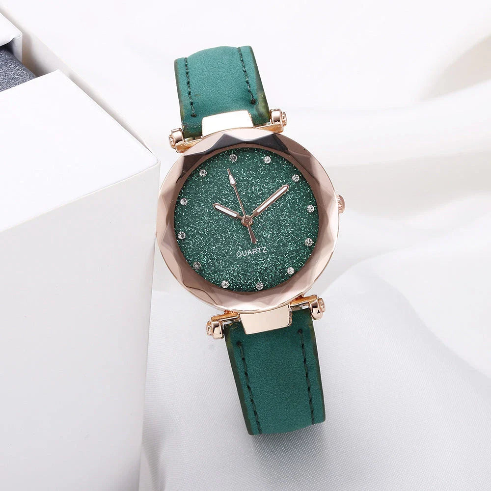 Elegant women's wrist watch with a captivating starry sky dial and leather strap, suitable for any occasion.