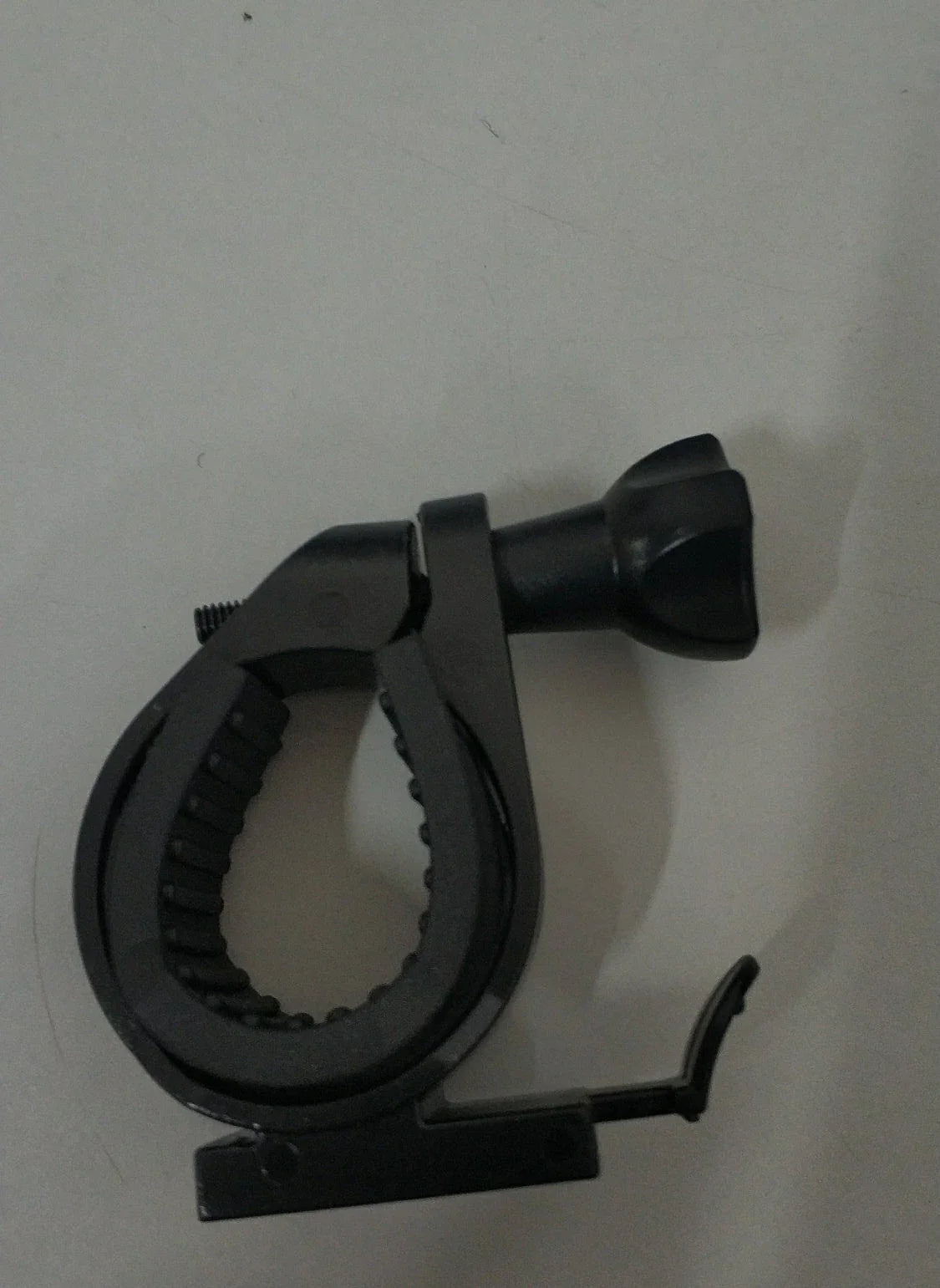 Multifunctional bike mount with horn, lights, and adjustable phone holder for secure storage and charging on the go