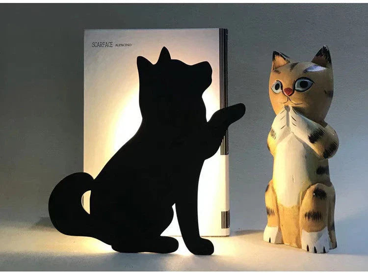 A stylish cat-themed LED lamp that automatically lights up when it detects sound, creating a cozy, ambient glow in a room.