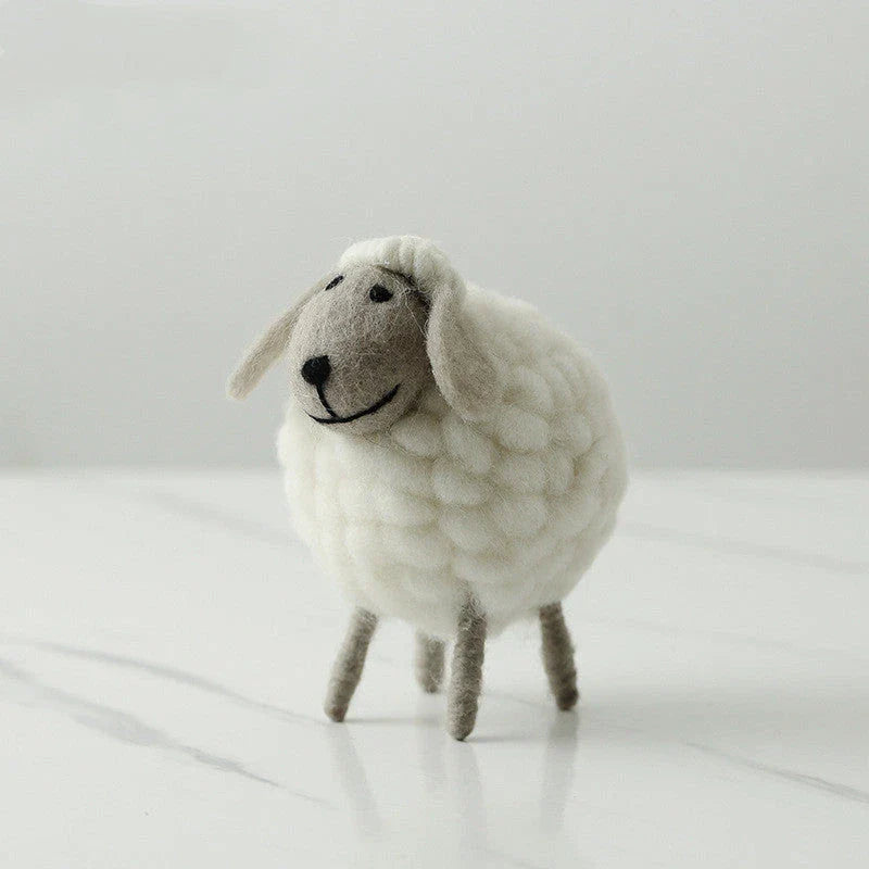 Plush sheep figurines in various colors and sizes, perfect for home decoration and gifting